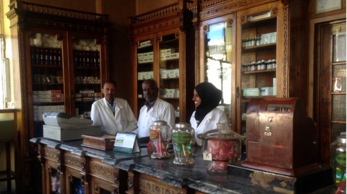 Employees inside the Farmacia Centrale in Asmara, Eritrea