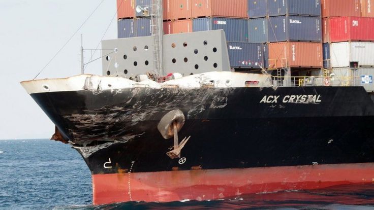 A handout photo made available by the 3rd Regional Coast Guard Headquarters shows the damaged container ship ACX Crystal after its collision with the US Navy destroyer USS Fitzgerald