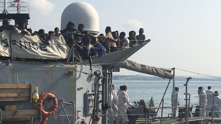 Hundreds of migrants arrive at Pozzallo in Sicily on a Navy ship