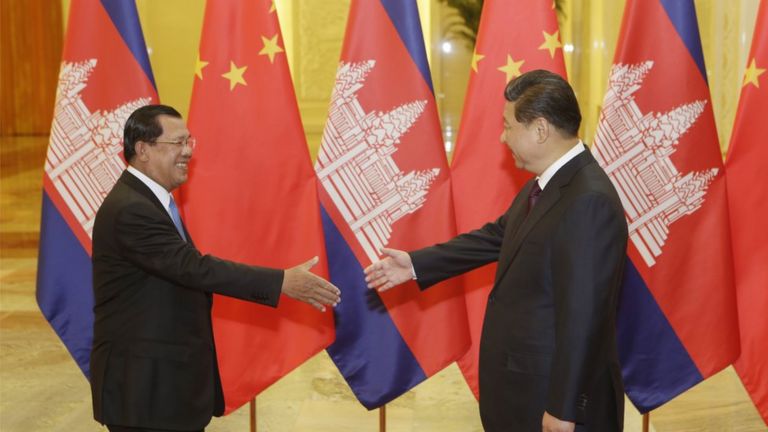 Cambodian PM Hun Sen greets Chinese president Xi Jinping