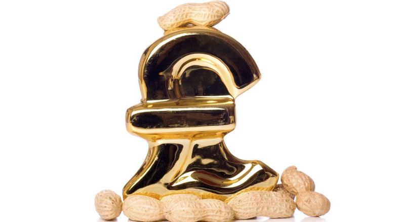 a gold pound sign surrounded by peanuts