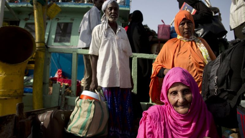 Elderly people waiting in a boat, Bossasso, Somalia