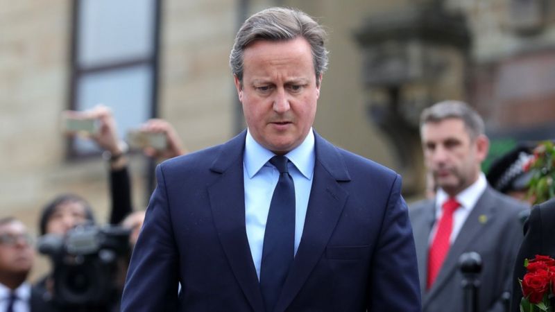 David Cameron pays his respects near to the scene where Jo Cox was killed