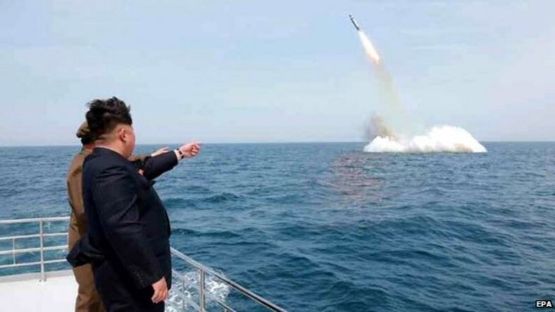 North Korean leader Kim Jong-un at the apparent launch of a missile from a submarine