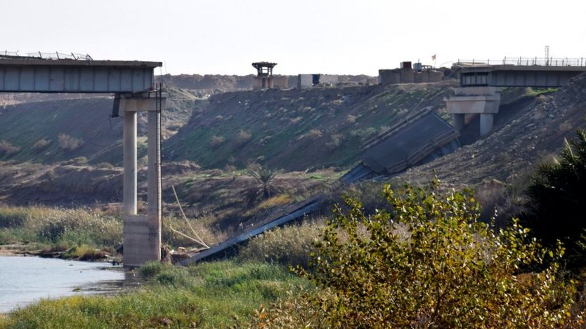 Destroyed bridge over the River Euphrates in northern Ramadi