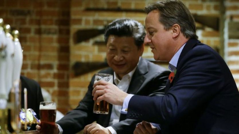 David Cameron and Xi Jinping sharing a pint at a Buckinghamshire pub