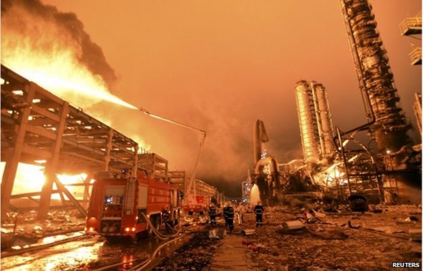 Firefighters try to extinguish a fire at a petrochemical plant in Zhangzhou, Fujian province 7 April 2015.