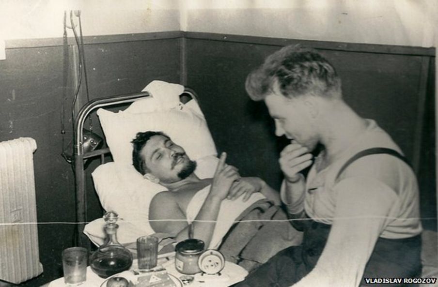 Leonid lying down talking to his friend Yuri Vereschagin