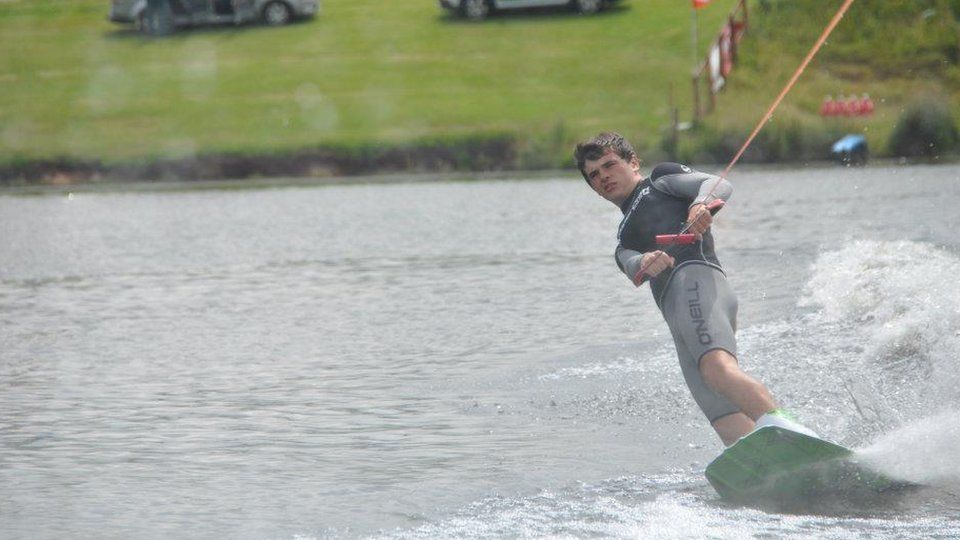 Ferrari pulls wakeboarder along flooded field