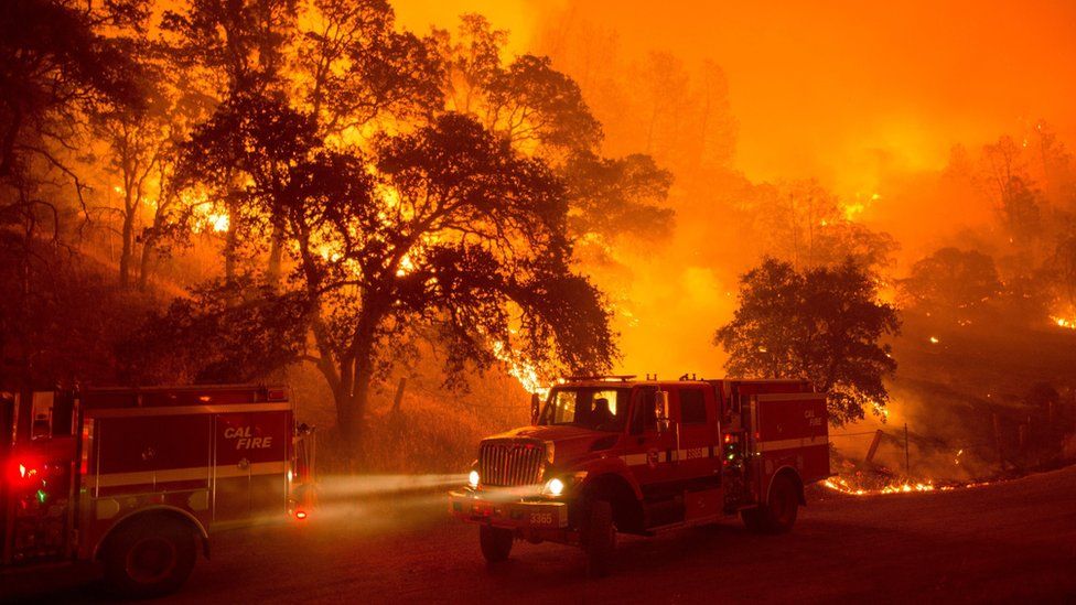 A fire truck moves position as flames from the Rocky fire approach near Clearlake California USA 02 August 2015