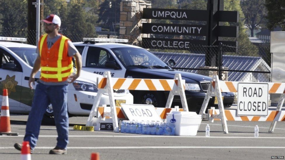 Police road block outside Umpqua Community College after the shooting