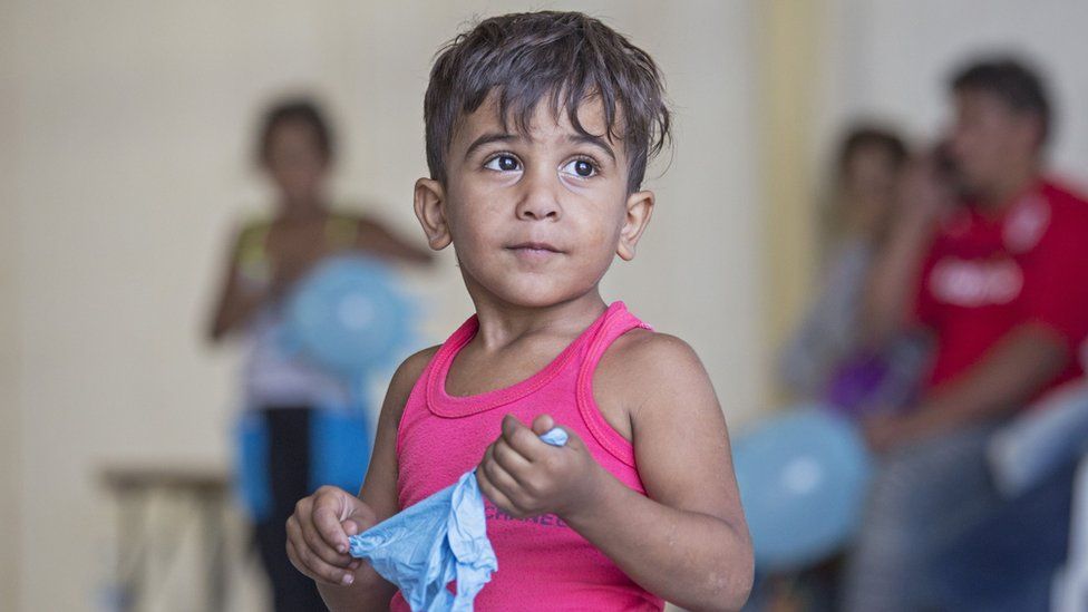 A young refugee housed at RAF base Akrotiri in Cyprus