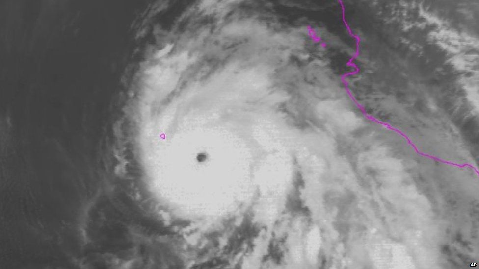 This satellite image taken on 15 July, 2015 at 01:00EDT and released by the National Oceanic and Atmospheric Administration (NOAA), Hurricane Dolores is moving west-northwest off the coast of Mexico.