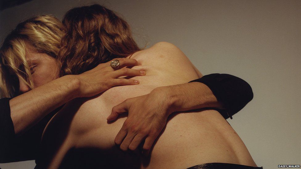 A picture of two models embracing by Daisy Walker