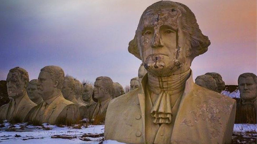 The giant heads of US presidents sit crumbling in a field in Virginia