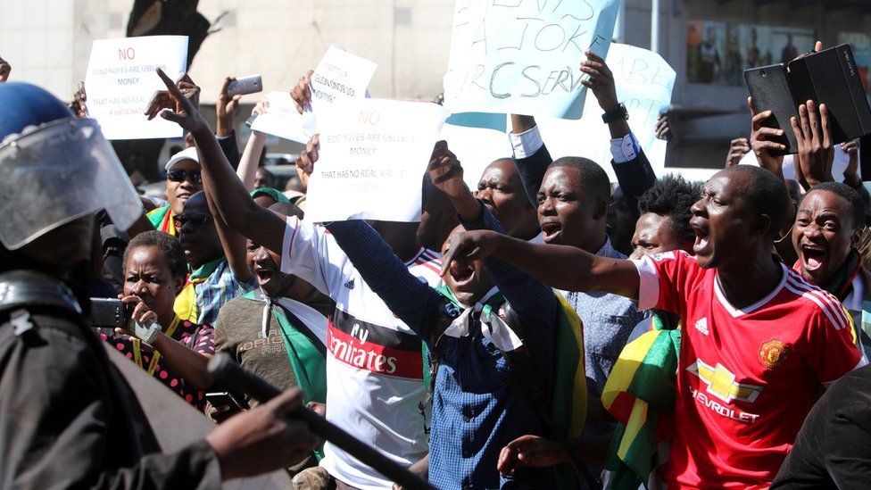 Protesters shouting at police in Harare, Zimbabwe - Wednesday 3 August 2016
