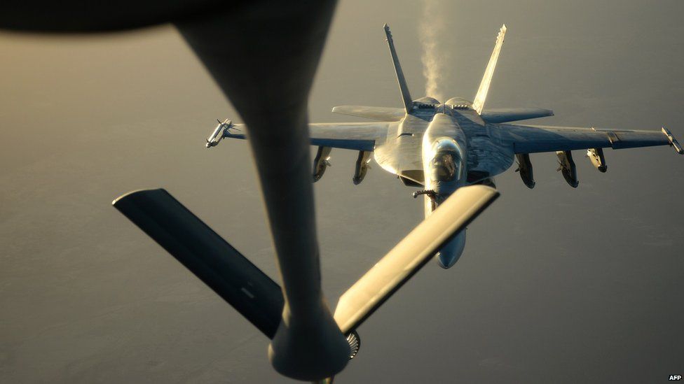 A US Navy F-18E Super Hornet returning after carrying out air strikes in Syria