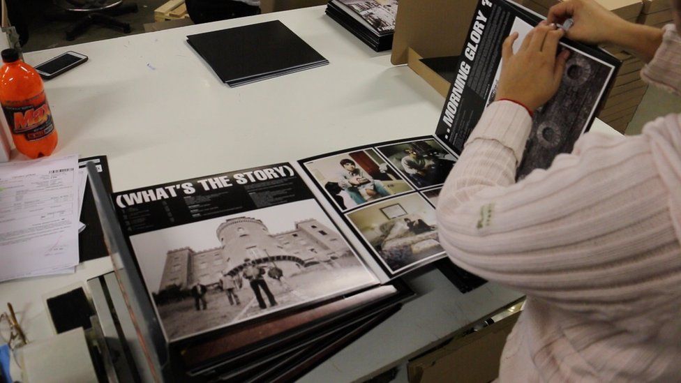 An Oasis album is packaged up