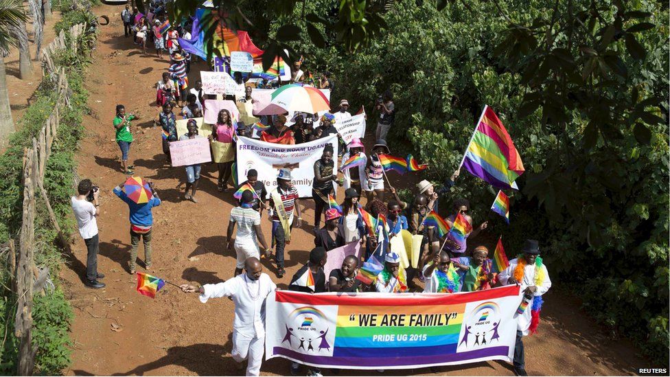 Members of the lesbian, gay, bisexual and transgender community parade in Entebbe, southwest of Uganda's capital Kampala on 8 August, 2015.