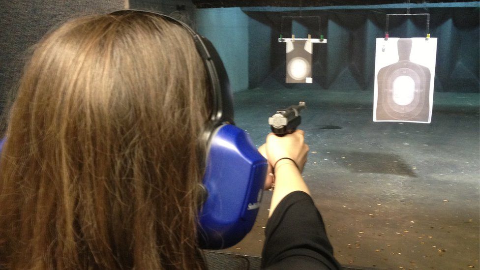 Kate Andrews shooting at a firing range