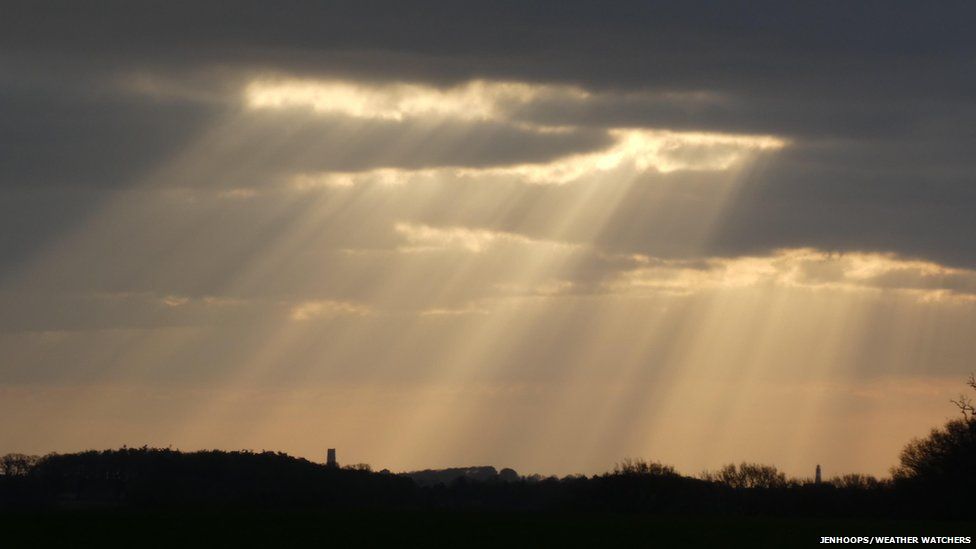 rays of sunlight through clouds