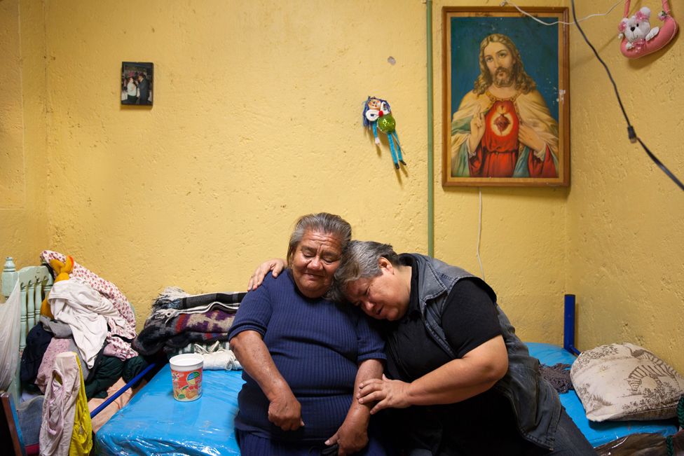 Residents of Casa Xochiquetzal hug