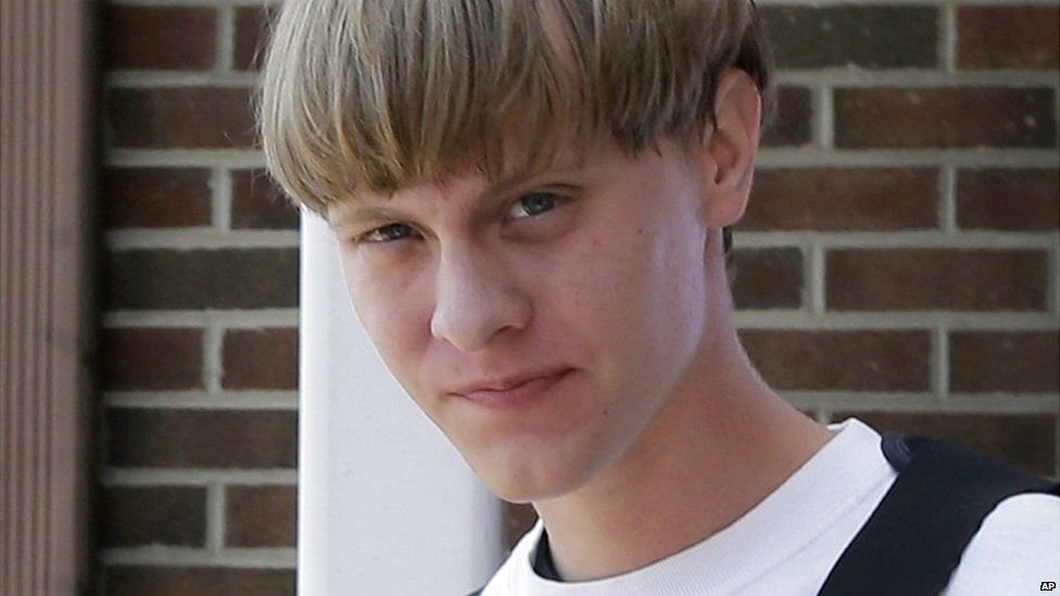 Charleston shooting suspect Dylann Roof is escorted from the Shelby police department - 18 June 2015