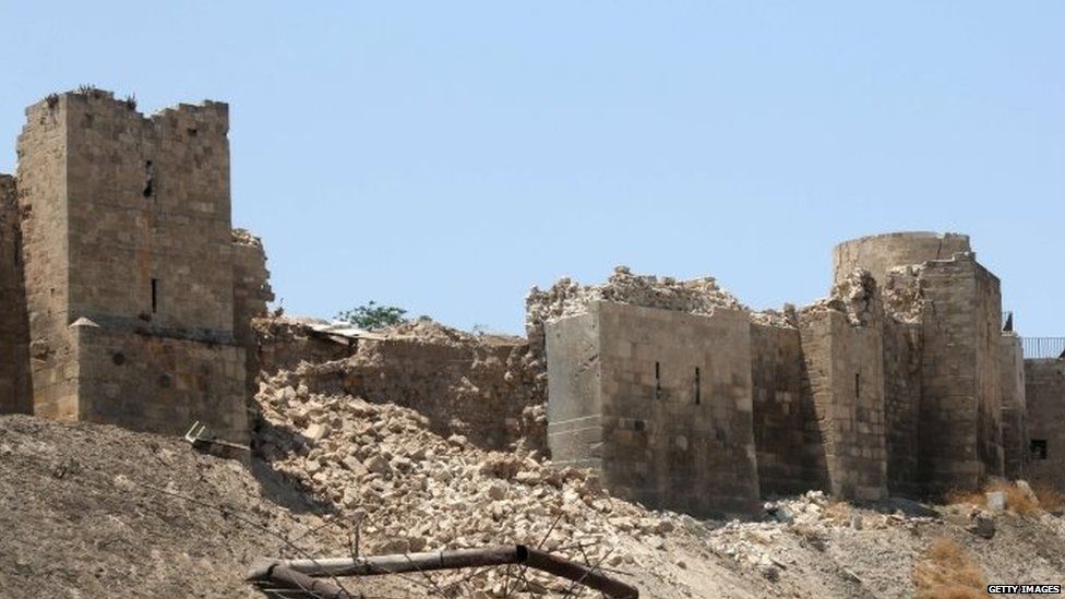 A damaged wall of Aleppo Citadel following a reported explosion the previous night in a tunnel near the monumental 13th-Century fortress. 12 July 2015