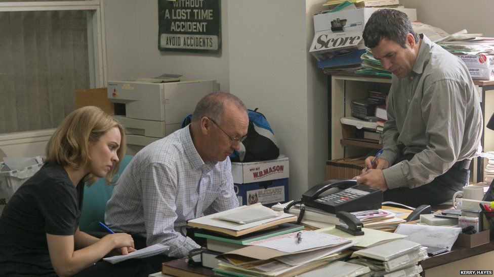 Rachel McAdams, Michael Keaton and Mark Ruffalo in the Boston Globe Spotlight office in a scene from the film