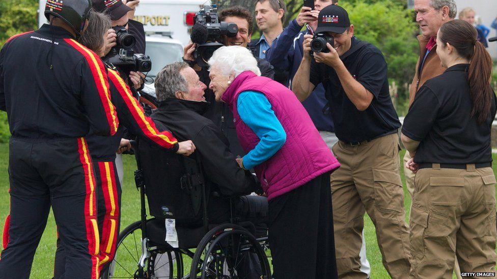 George HW Bush after his sky dive