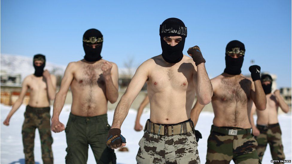 Rebel fighters with the Jaish al-Islam (Army of Islam) during a training session