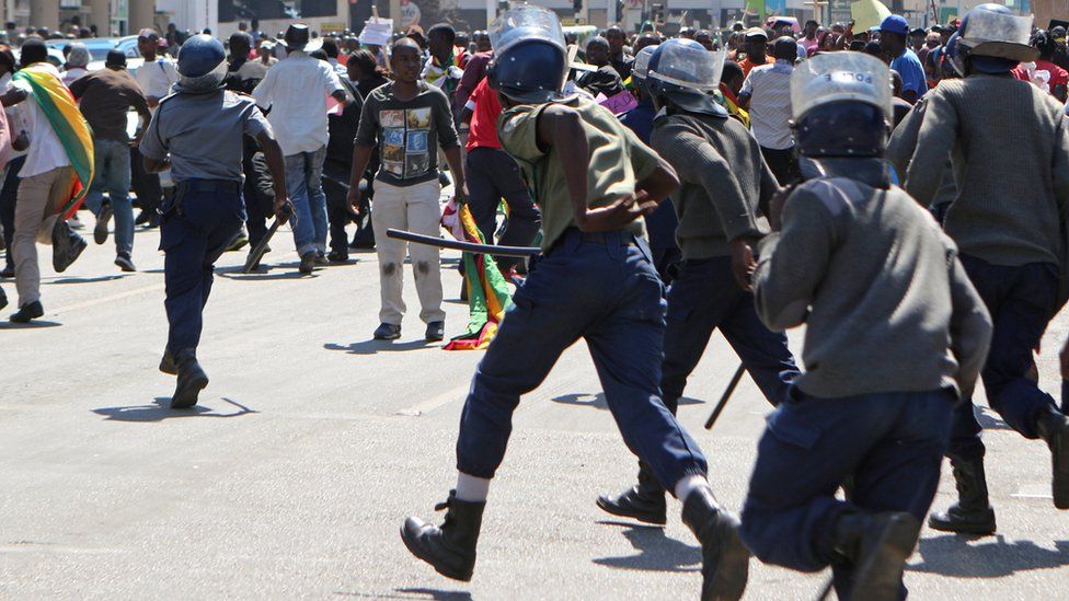 Police chasing protesters in Harare, Zimbabwe - Wednesday 3 August 2016