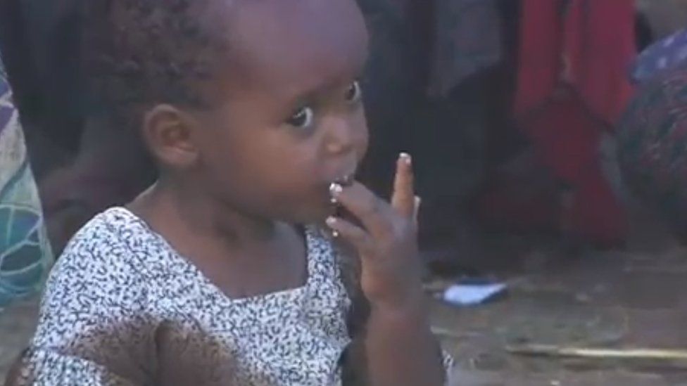 Child eating with her hands