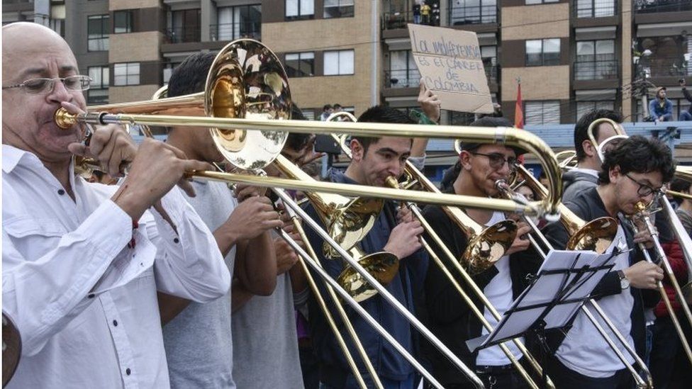 Musicians of the conservatory of the National University of Colombia play their instruments during a protest in Bogota, Colombia