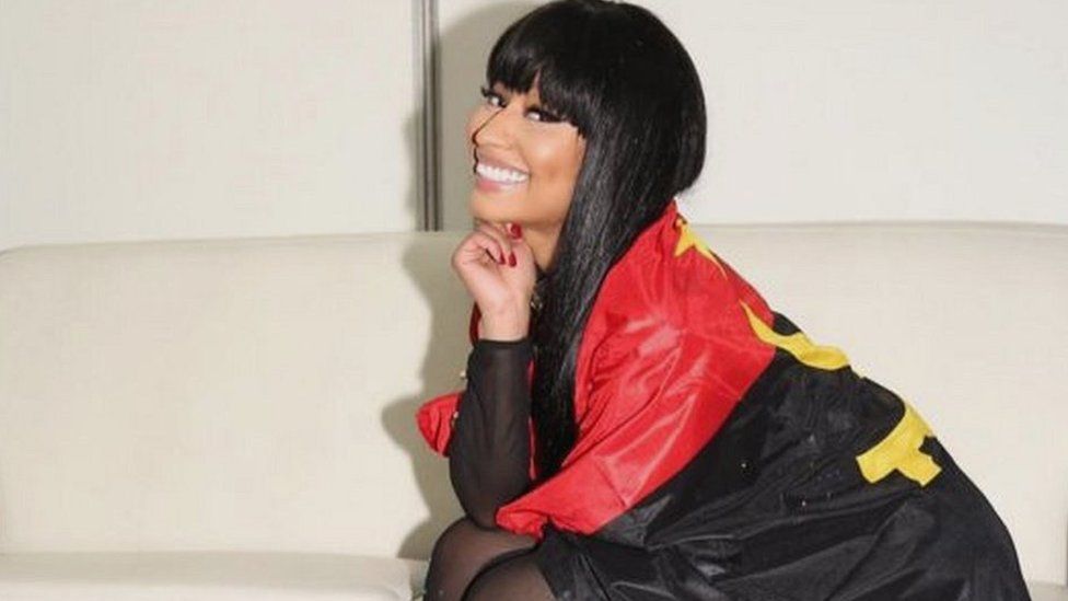 Nicki Minaj wearing the Angola flag