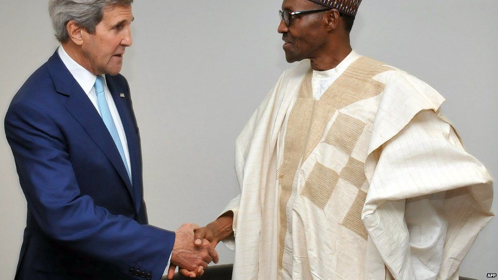 John Kerry shakes hands with Muhammadu Buhari in Abuja on 29 May 2015
