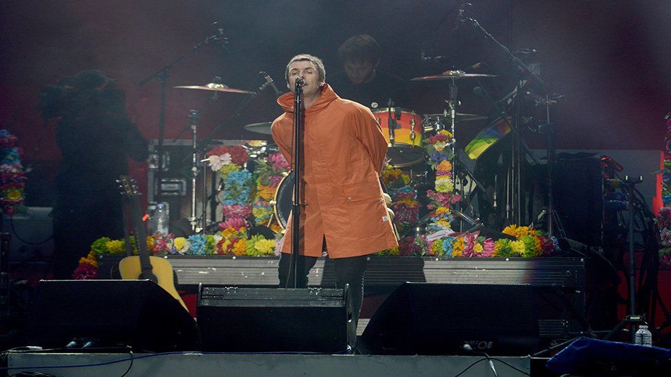 This is a photo of Liam Gallagher on stage performing at One Love Manchester