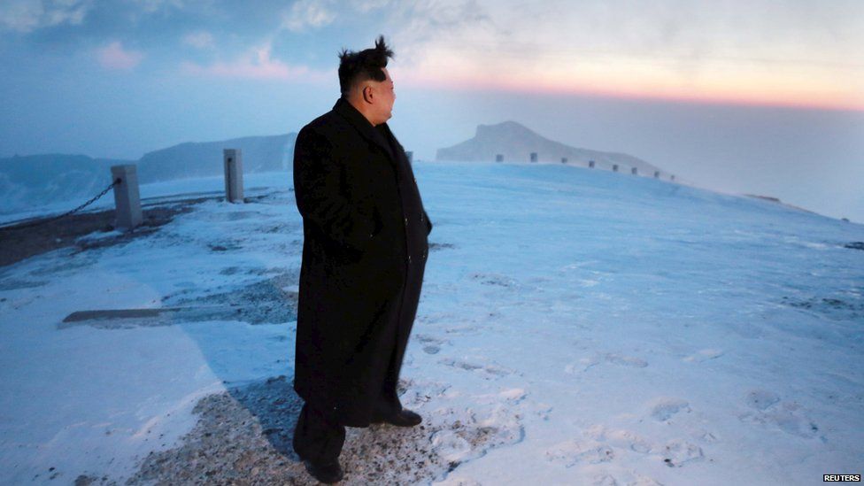 Kim Jong-Un on top of a mountain