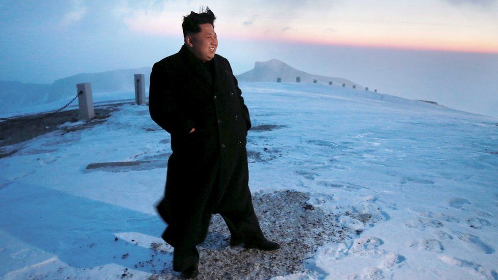 Kim Jong-Un on top of a mountain