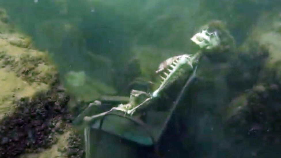 Diver Finds Underwater Skeleton Tea Party Bbc Newsbeat