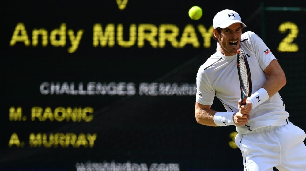 Andy Murray returns a serve in the Wimbledon Final