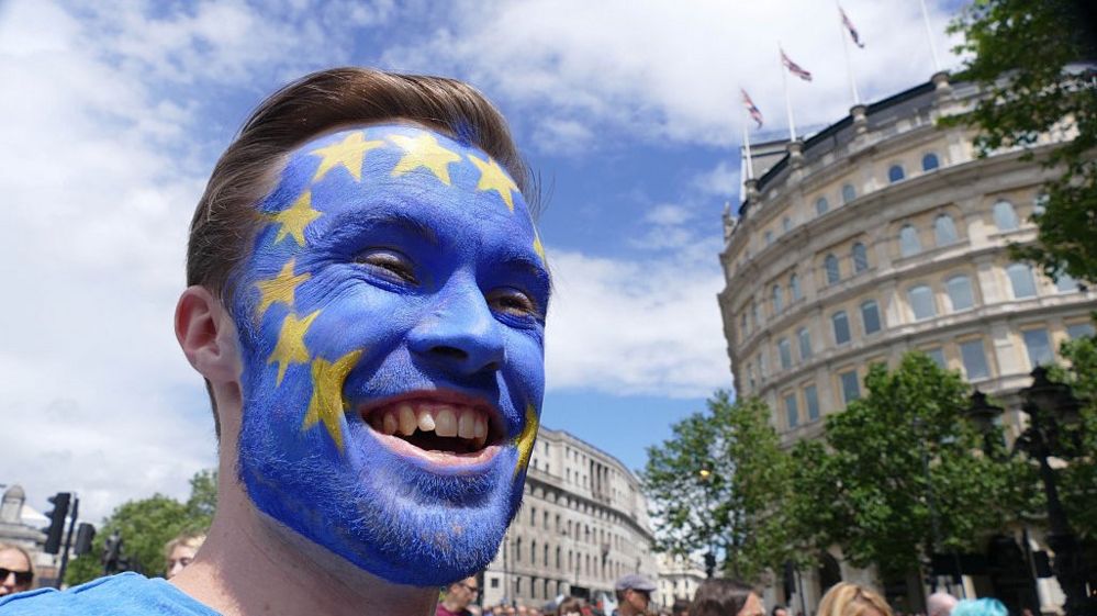 man with eu flag on face