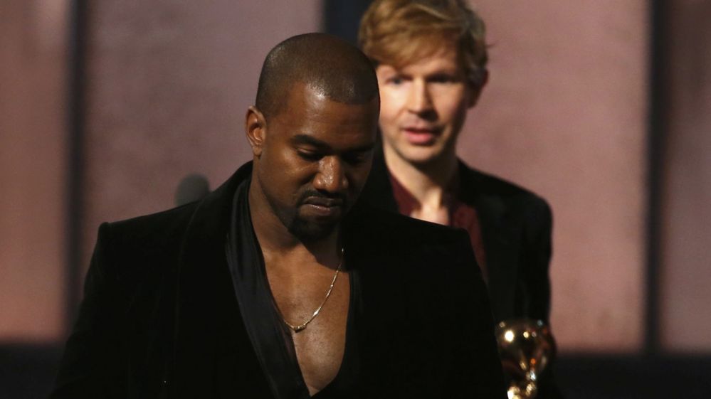 Kanye West walking away from Beck