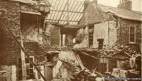Postcard showing the destruction of housing in Hartlepool from the bombardment
