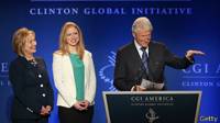 Bill, Hillary y Chlesea Clinton