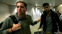 El periodista Gleen Greenwald y su pareja David Miranda