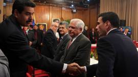 Nicolás Marudo y Henrique Capriles