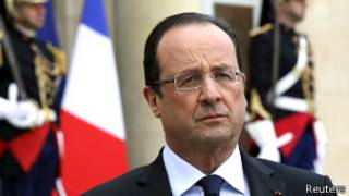 Hollande se compromete con los suburbios