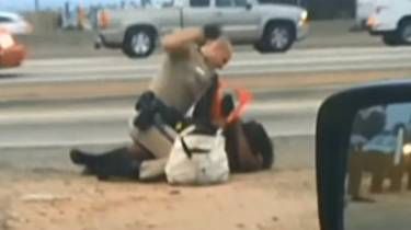 Policial agride mulher (BBC)