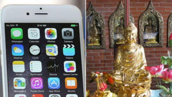 Chiếc Iphone 6 và tượng Phật tại Chùa Bái Đính (ảnh minh họa)